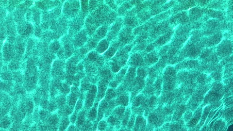 Blue water surface of a pool aerial top shot sunny day  Stock Footage 251065694