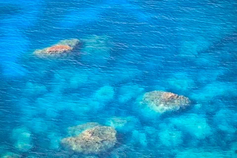 Blue water surface with reflection Stock Photos