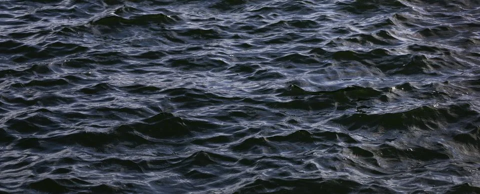 Blue water surface with small waves, Abstract background, Graphic elements, Foto stock