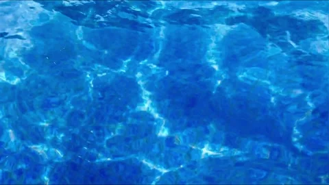 Blue water surface in the swimming pool Stock Footage 296799679