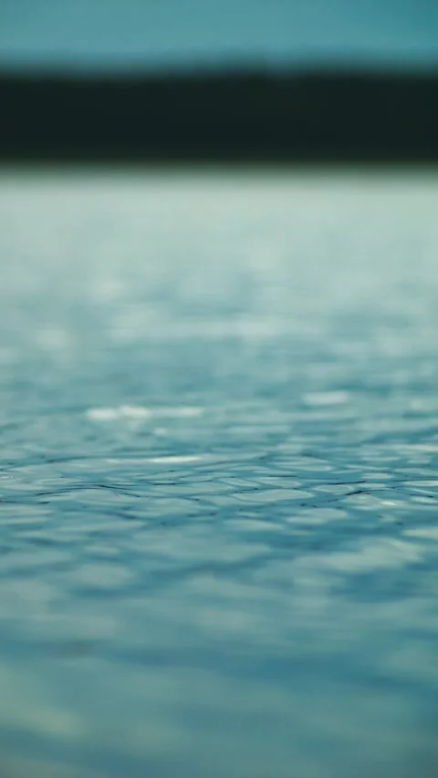 Blue water surface vertical video. blue water waves, clean water, fresh water Stock Footage 271547084