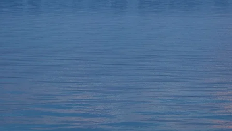 Blue water surface, waves, on sunset Stock Footage 91828118