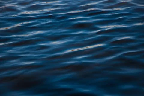 Blue water surface waves wind freshness of summer Stock Photos