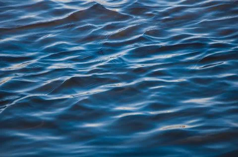 Blue water surface waves wind freshness of summer Stock Photos