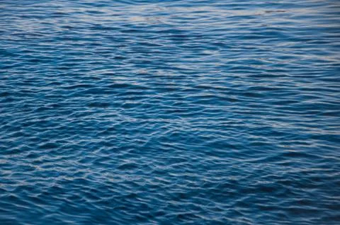 Blue water surface waves wind freshness of summer Stock Photos