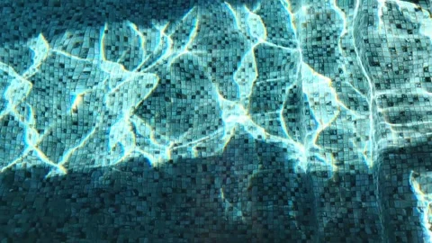 Blue water in the swimming pool with light reflections. Video stock 263754469