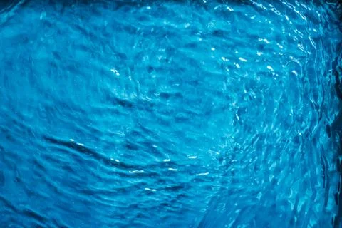 Blue water texture as abstract background, swimming pool and waves design Stock Photos