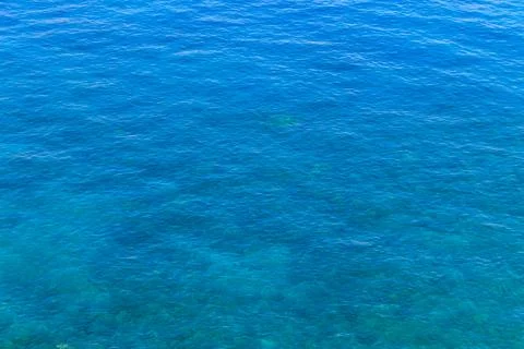 Blue water texture background. Surface of the sea Stock Photos