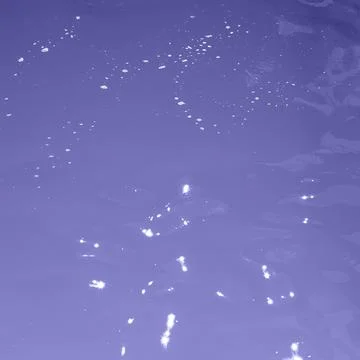 Blue water wave texture background. Rippled water. Shiny purple and blue water Stock Photos