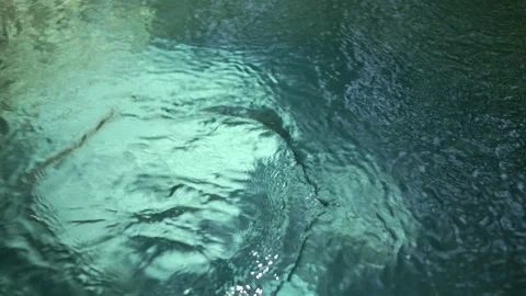 Blue water waves surface close up in swimming pool, background with copy space. Video stock 252250582