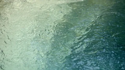 Blue water waves surface close up in swimming pool, background with copy space. Stock Footage 252382776
