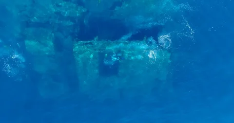 Blue water with wreck under, bubbles from divers coming to the surface Stock-Footage 114573680