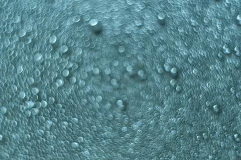 Blue waterdrop bokeh psychedelic pattern for background Stock Photos