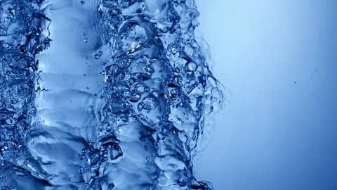 Blue wave crossing the frame, slow motion Stock Footage 92812504