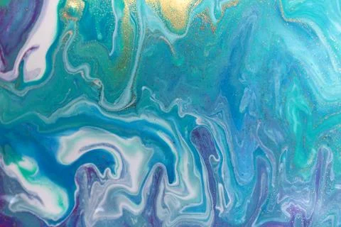 Blue wave pattern with layers of gold sequins. Illustrazione stock