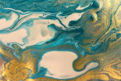 Blue wave pattern with layers of gold sequins. Foto stock