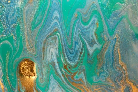 Blue wave pattern with layers of gold sequins. Foto stock