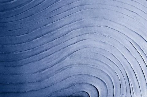 Blue wave pattern on sand cement Stock Photos