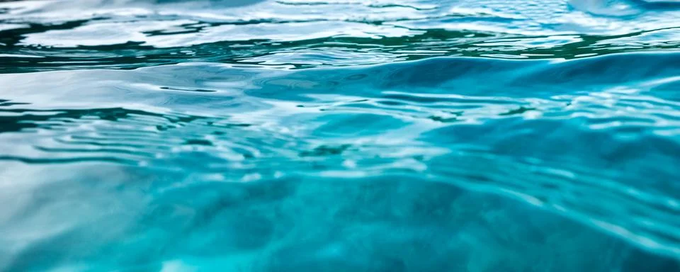 Blue wave surface ripple background Stock Photos