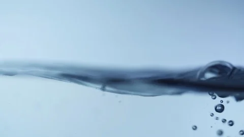 Blue wave water with bubbles , slow motion movement Stock Footage 114584461