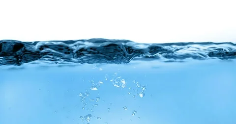 Blue wave water with bubbles in tank on white background, slow motion movement Vidéo 92894697