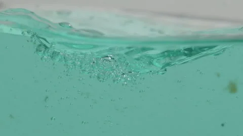 Blue wave water with bubbles in tank Video stock 245504756