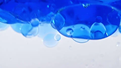 Blue Wave Water with Bubbles on White Background. Oxygen Bubbles in Clear Blue Stock-Footage 151357108
