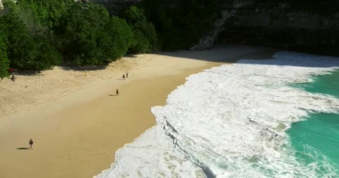 Blue waves at the beach aerial view form drone camera high quality Stock Footage 310322537