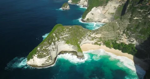 Blue waves at the beach aerial view form drone camera high quality Stock Footage 310386390