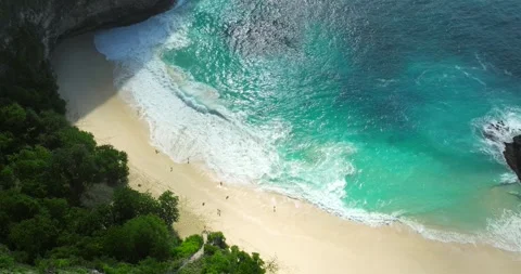 Blue waves at the beach aerial view form drone camera high quality Stock Footage 310386465