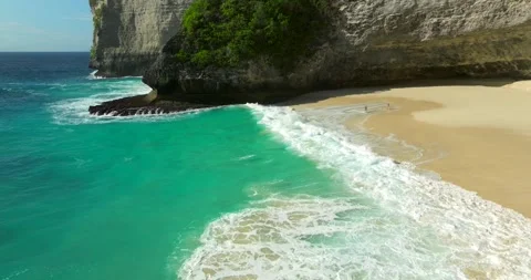 Blue waves at the beach aerial view form drone camera high quality Stock Footage 310401612