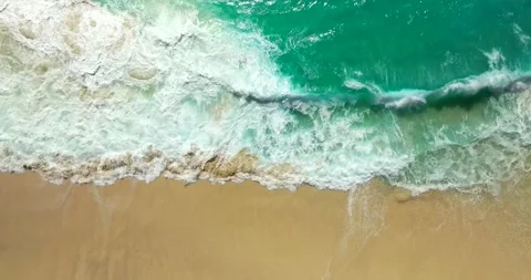 Blue waves at the beach aerial view form drone camera high quality Stock Footage 310401878