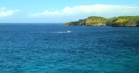 Blue waves at the beach aerial view form drone camera high quality Stock Footage 310437199