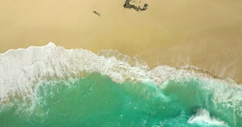 Blue waves at the beach aerial view form drone camera high quality Stock Footage 310437273