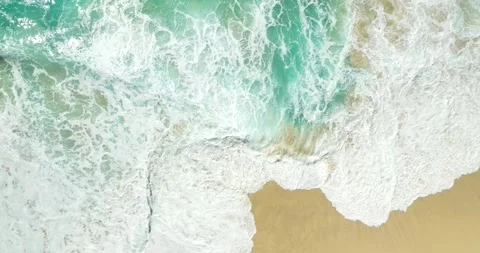 Blue waves at the beach aerial view form drone camera high quality Stock Footage 310437325