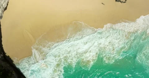Blue waves at the beach aerial view form drone camera high quality Stock Footage 310488787