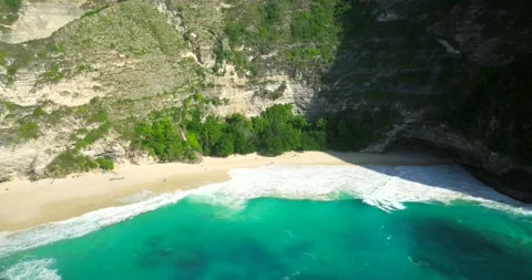 Blue waves at the beach aerial view form drone camera high quality Stock Footage 310646055