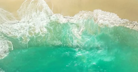 Blue waves at the beach aerial view form drone camera high quality Stock Footage 310646059