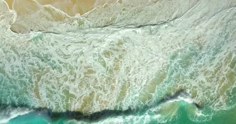 Blue waves at the beach aerial view form drone camera high quality Stock Footage 310646084