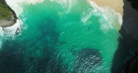 Blue waves at the beach aerial view form drone camera high quality Stock Footage 310704089