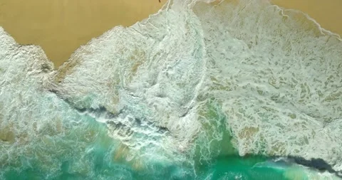 Blue waves at the beach aerial view form drone camera high quality Stock Footage 311373620