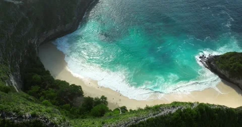 Blue waves at the beach aerial view form drone camera high quality Stock Footage 311373666
