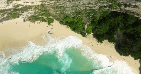 Blue waves at the beach aerial view form drone camera high quality Stock Footage 311495767