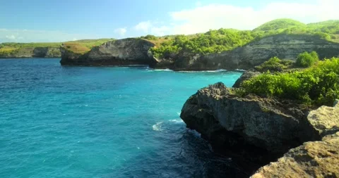 Blue waves at the beach aerial view form drone camera high quality Stock Footage 311591245