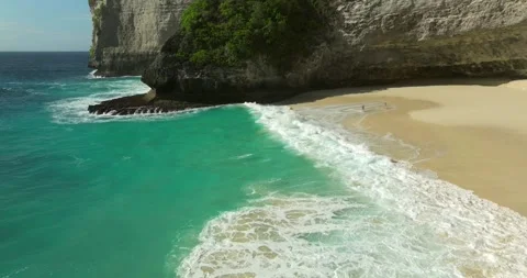 Blue waves at the beach aerial view form drone camera high quality Stock Footage 311591664