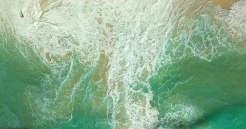 Blue waves at the beach aerial view form drone camera high quality Stock Footage 311592183