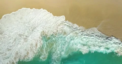 Blue waves at the beach aerial view form drone camera high quality Stock Footage 311593166
