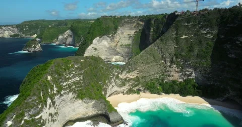 Blue waves at the beach aerial view form drone camera high quality Stock Footage 311594288