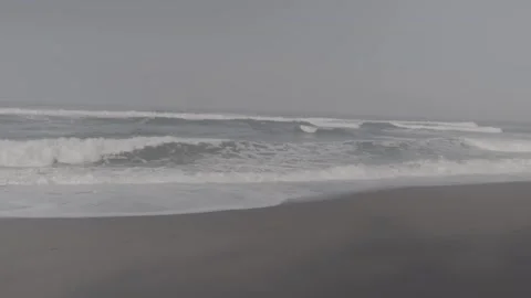 Blue waves on a clean beach Stock Footage 316574306