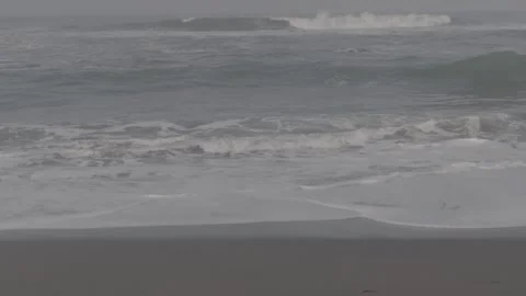 Blue waves on a clean beach Stock Footage 316574345